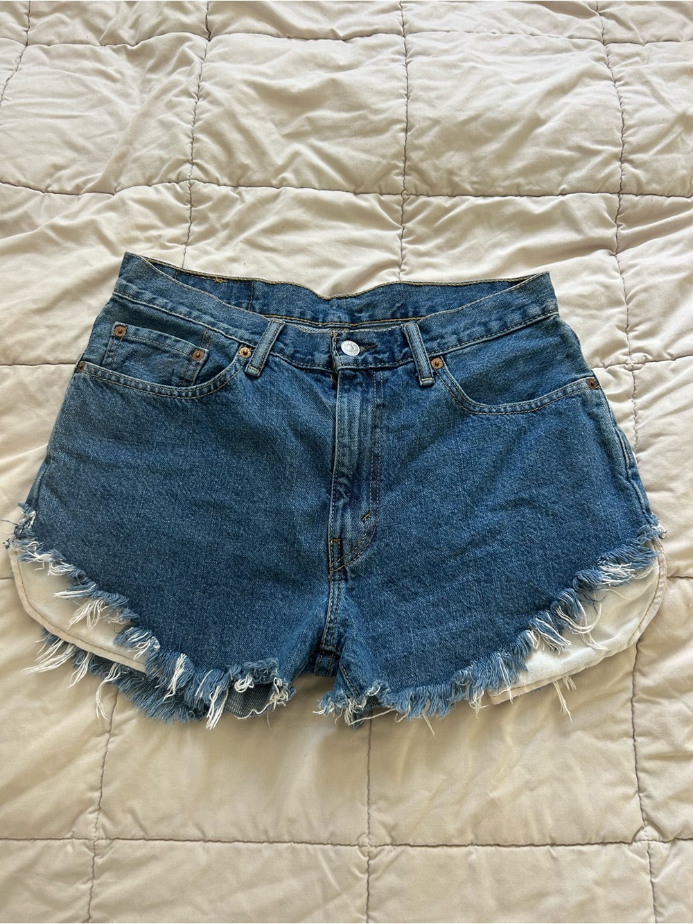 Levi's Medium Blue Frayed Hem Denim Shorts